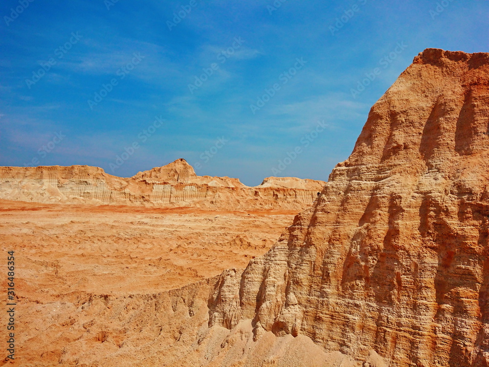 Fototapeta premium Old mining Red surface land like canyon dry hill material