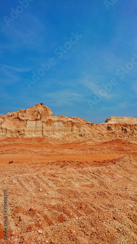 Old mining Red surface land like canyon dry hill material 