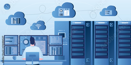 Big data analytics and cloud computing. Handsome male programmer or analyst on workplace.
