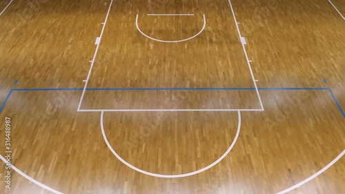 Drone aerial view of a big Basketball professional arena before the game started. 4k video photo