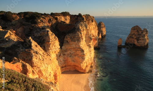 Sunrise on cliffs at Ponte ds Piedade, Algarve, Portugal