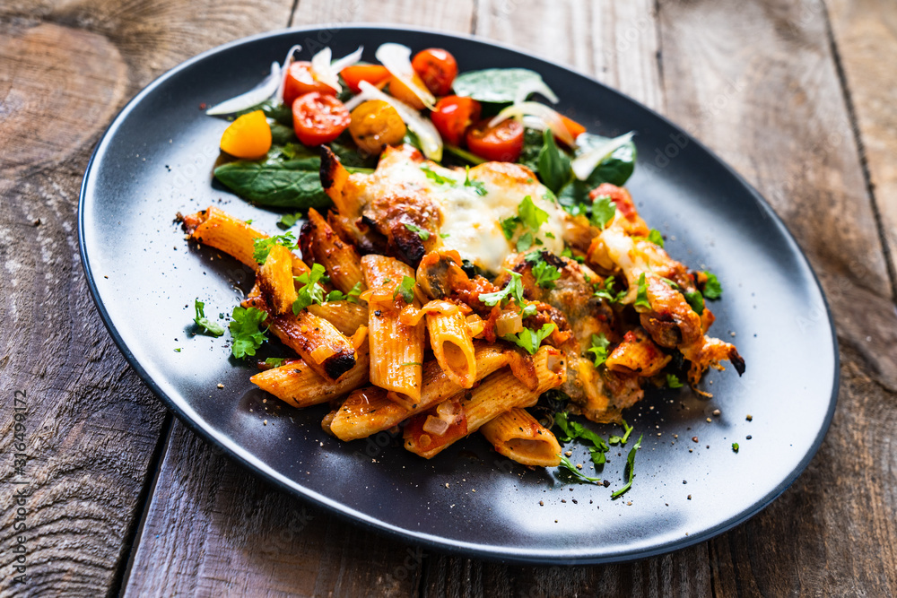 Pasta casserole with barbecue chicken breast, cheese and vegetables Pasta casserole with barbecue chicken breast, cheese and vegetables