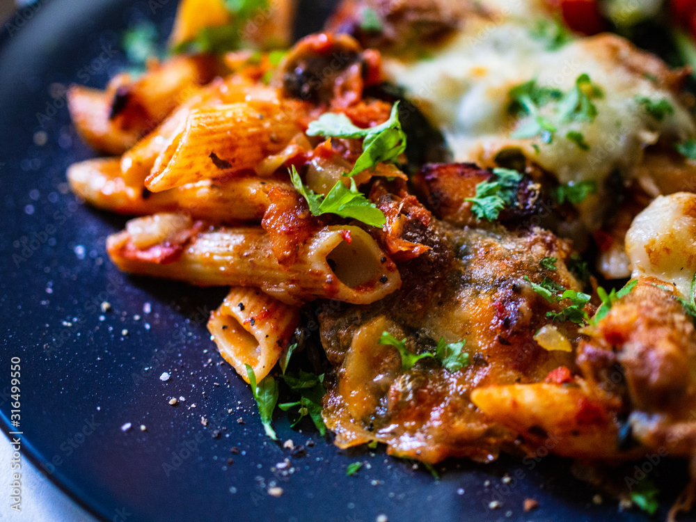 Pasta casserole with barbecue chicken breast, cheese and vegetables Pasta casserole with barbecue chicken breast, cheese and vegetables