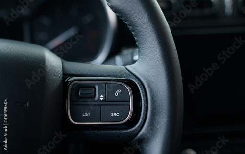 Functional car steering wheel with voice control.