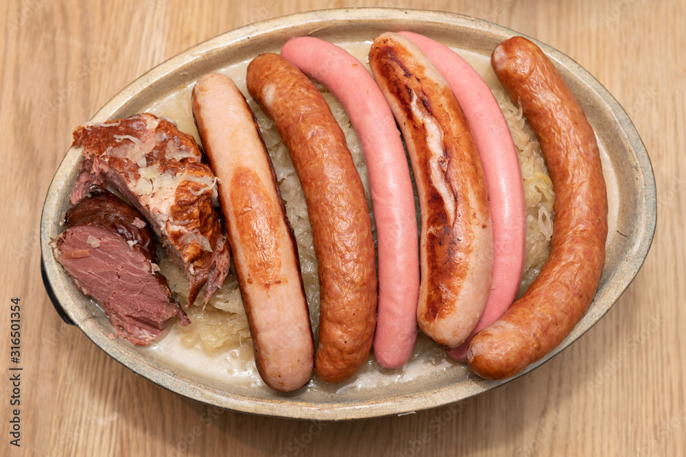 Central and Eastern European cuisines choucroute - sauerkraut with riesling Central and Eastern European cuisines choucroute - sauerkraut with riesling