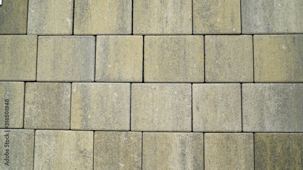 Obraz premium Natural stone wall texture. Rustic colorful surface floor pavement background. Texture tile