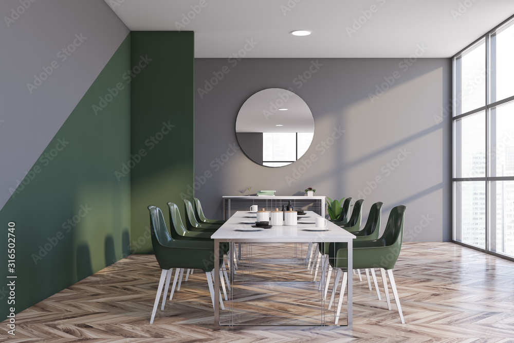 Gray and green dining room interior