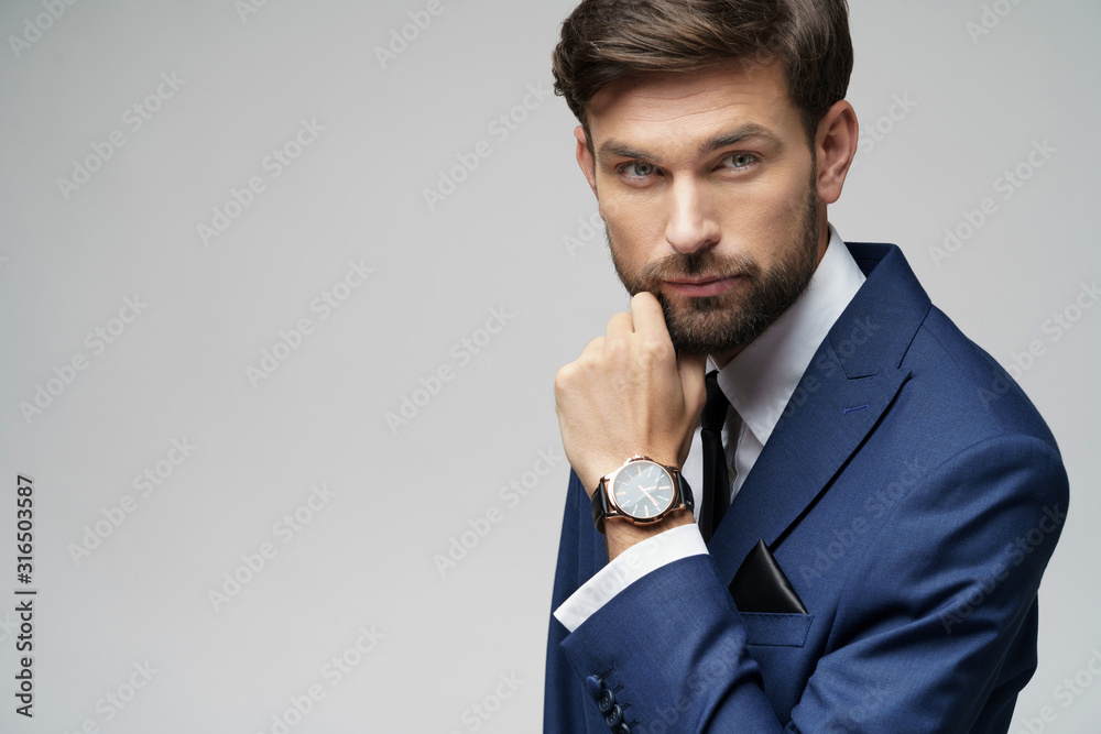 Studuo shot of thinking businessman wearing suit Studuo shot of thinking businessman wearing suit
