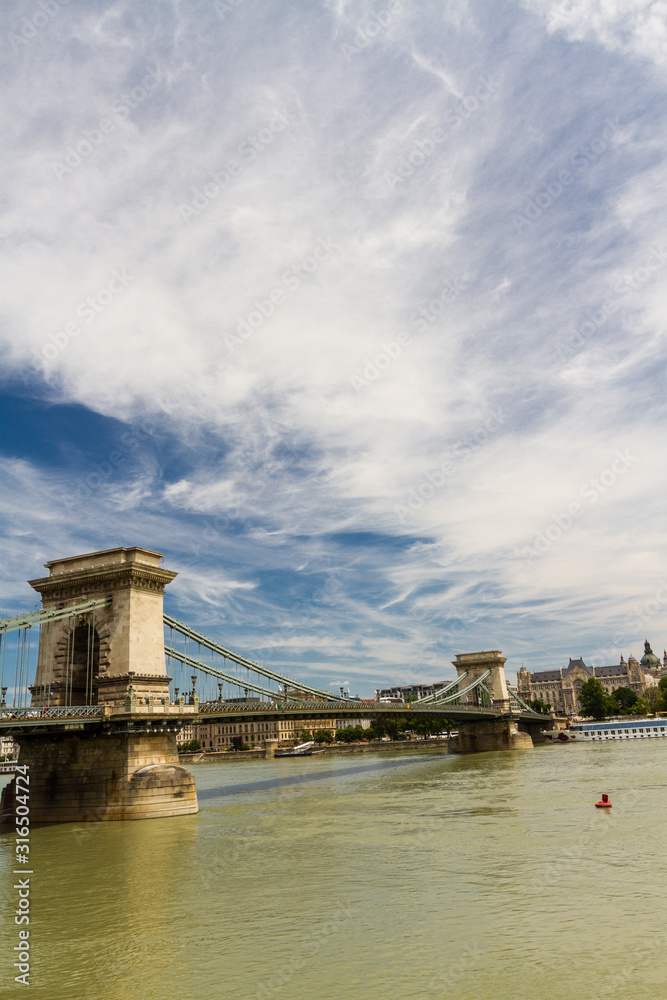 Obraz premium Budapest Chain Bridge with dramatic sky and copyspace