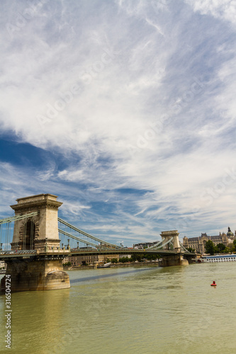 Budapest Chain Bridge with dramatic sky and copyspace