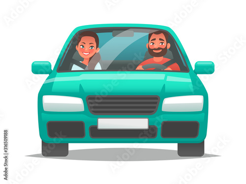 Happy couple of young people rides a car. A man driving a vehicle and a woman sitting in the passenger seat. A fun car trip  husband and wife.