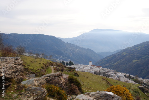 Wiew of Bubión with mountains. photo