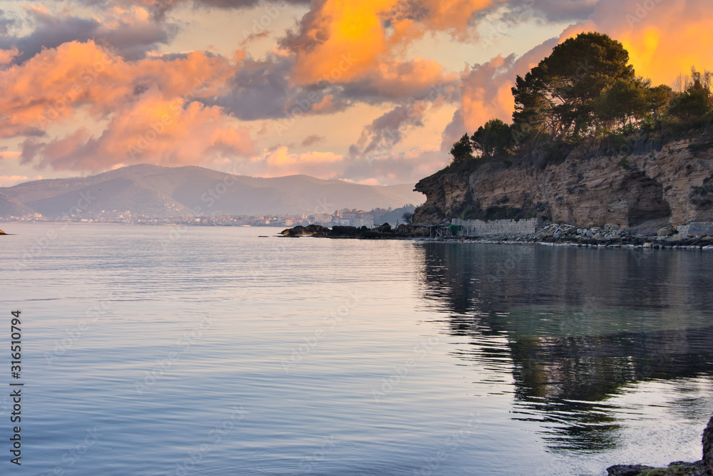 Sunset on the Mediterranean Sea with Still Water and Reflections