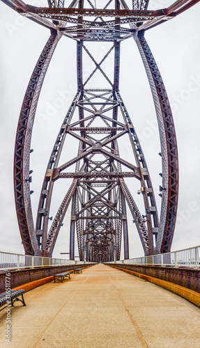 Close up picture of the impressive steel frame structure of the Big Four bridge in Louisville during daytime © Aquarius