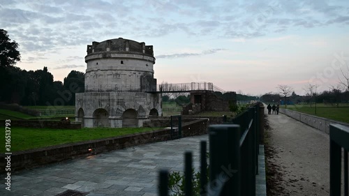 Ravenna, Italy, December 2019. The mausoleum of Theodoric is the most famous funerary construction of the Ostrogoths. There is a flat park: you can immediately notice it with its imposing structure photo