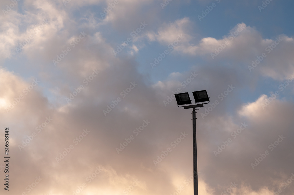 background with clouds and spotlight