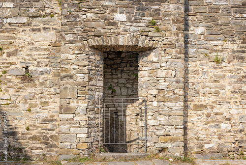 detail of a wall inside the Medieval castle of Berceto town, Province of Parma, Emilia-Romagna, Italy