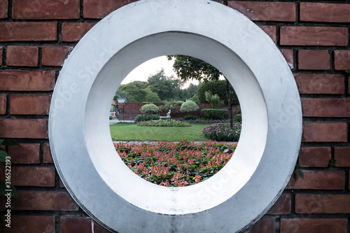 Looking through the holes of a park.