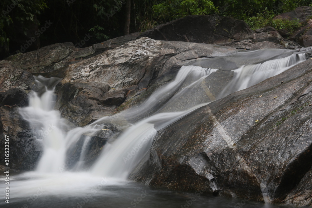 Obraz premium waterfall in the forest