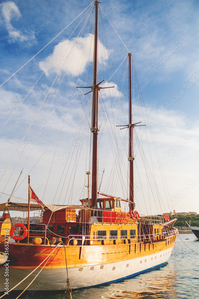 Sailing ship moored on sea embankment, Sliema, Malta. Sailing ship moored on sea embankment, Sliema, Malta.