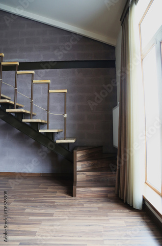 Modern loft penthouse with stairs and two levels. Popular type of apartment.   © Maria Kasimova