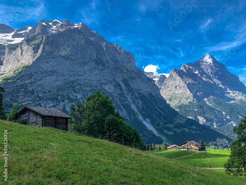A single Hut with magnificent view of the swiss alps in Grindelwald, Switzerland © alexandernative