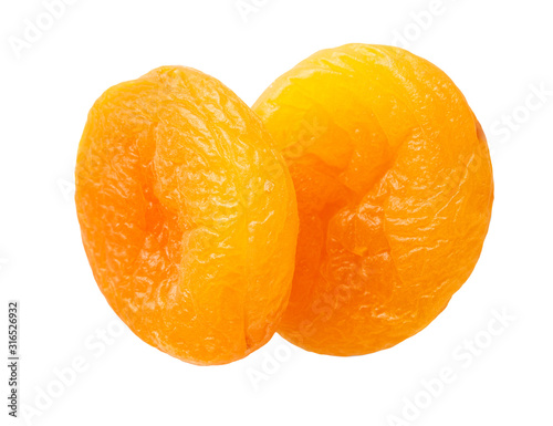 two dried apricots isolated on white background