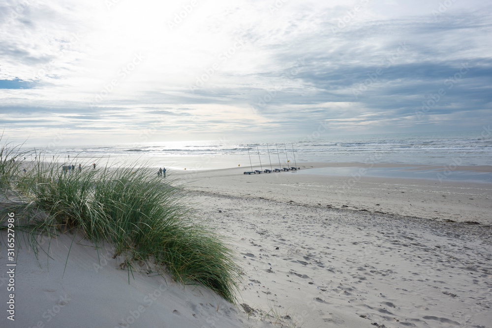France; Picardie. Fort-Mahon. club de char à voile sur la plage de sable.  sand yachting club on the sandy beach. Stock Photo | Adobe Stock