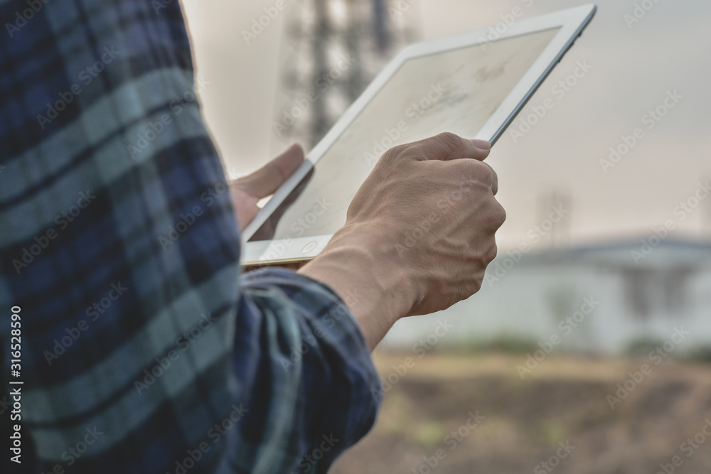 Close up Construction Engineering holding tablet building estate construction background Close up Construction Engineering holding tablet building estate construction background
