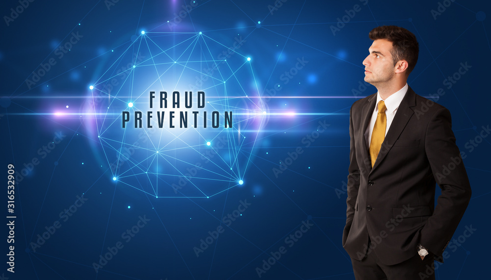 Businessman thinking about security solutions with FRAUD PREVENTION inscription Businessman thinking about security solutions with FRAUD PREVENTION inscription