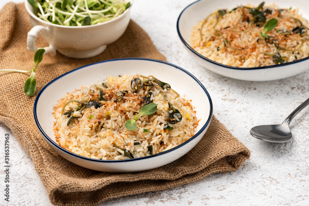fired rice with vegetable on white backdrop