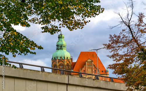 View across a highway to a historic post office with a beautifully decorated brick facade in Berlin, Germany. photo