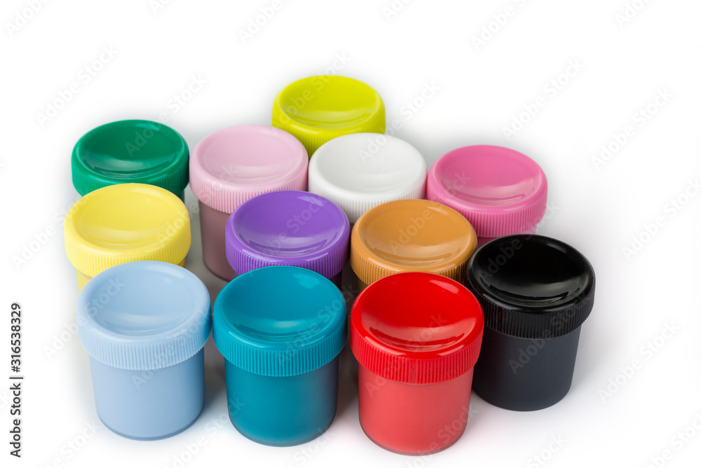 School paint in the plastic containers on a white background School paint in the plastic containers on a white background