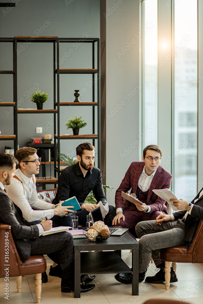 business people wearing formal wear gathered in office for holding business conference with partners, successful young guys together in modern boardroom business people wearing formal wear gathered in office for holding business conference with partners, successful young guys together in modern boardroom