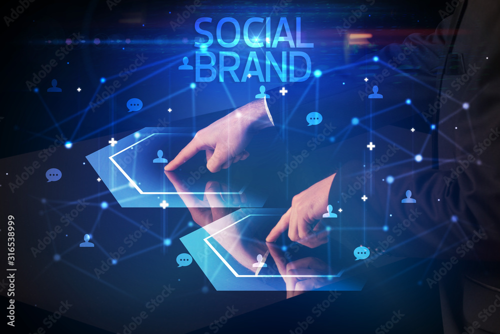 Navigating social networking with SOCIAL BRAND inscription, new media concept Navigating social networking with SOCIAL BRAND inscription, new media concept