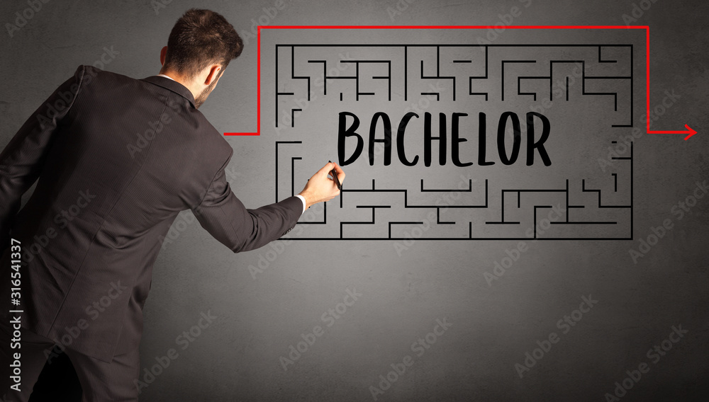 businessman drawing maze with BACHELOR inscription, business education concept