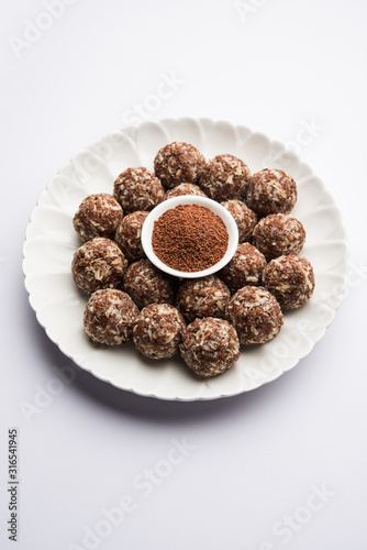 Aliv Laddu, Halim Ladoo or Garden cress Seed sweet Balls a very nutritious food in winters or for New Moms. popular food from India. served in a bowl or plate