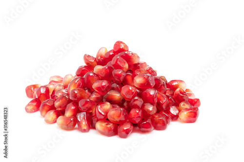 Natural fresh ripe pile pomegranate fruit isolated on white background with clipping path