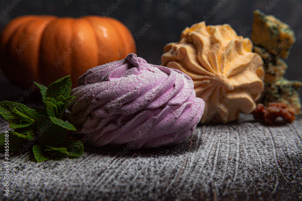 Delicate flavorful pumpkin marshmallows with gorgonzola and blueberry marshmallows with mint
