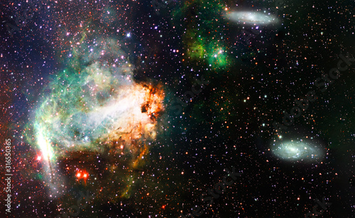 Stars, dust and gas nebula in a far galaxy space background