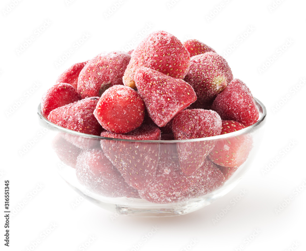 Frozen strawberries in glass bowl isolated on white background