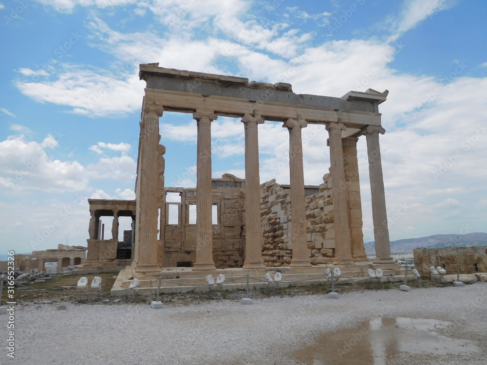Acropolis in Athens on a sunny day with some cloud