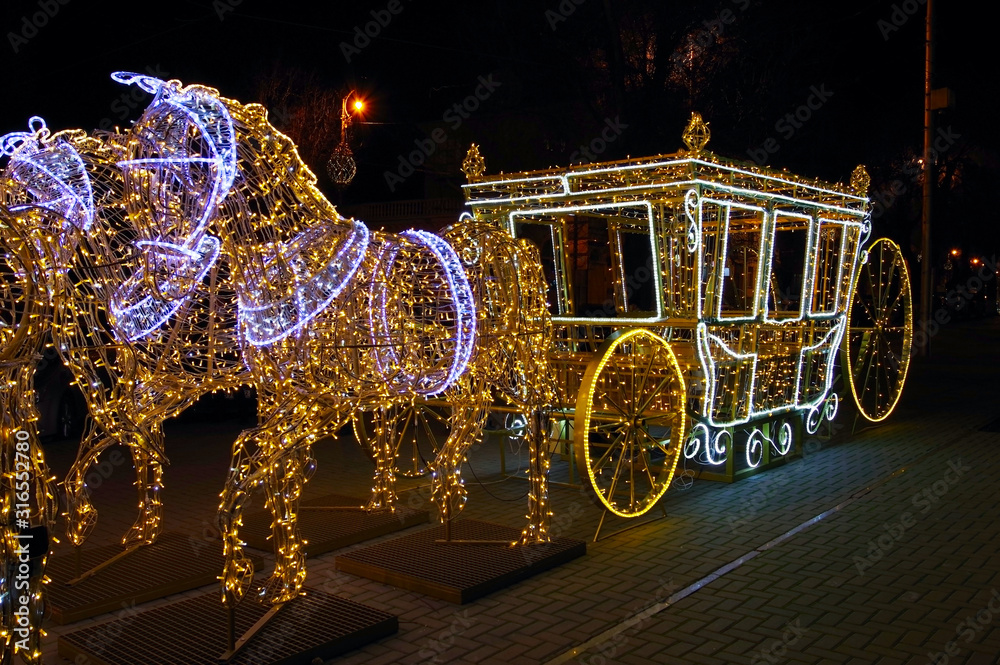 carriage with horses made of light bulbs