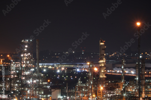 Petrochemical industry in the night time. © Shinonome Studio