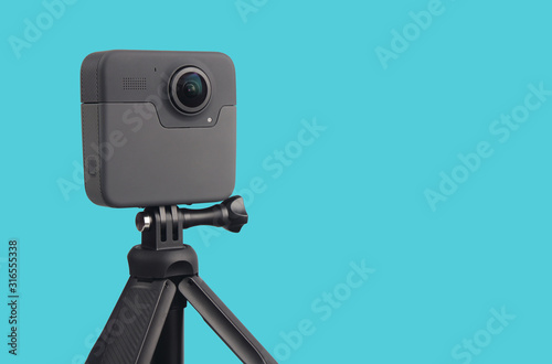 Modern 360 degree digital camera with tripod