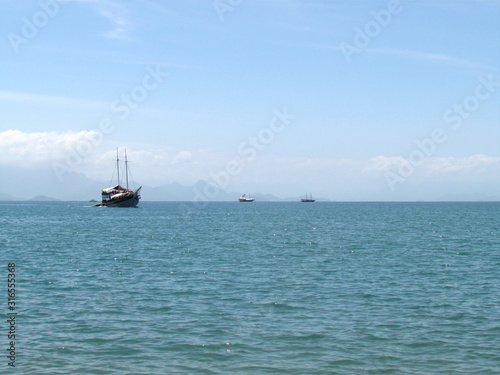 Tour boats on a calm sea
