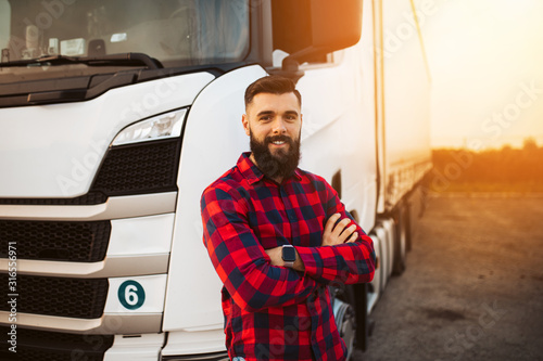 Truck driver preparing for the next destination photo