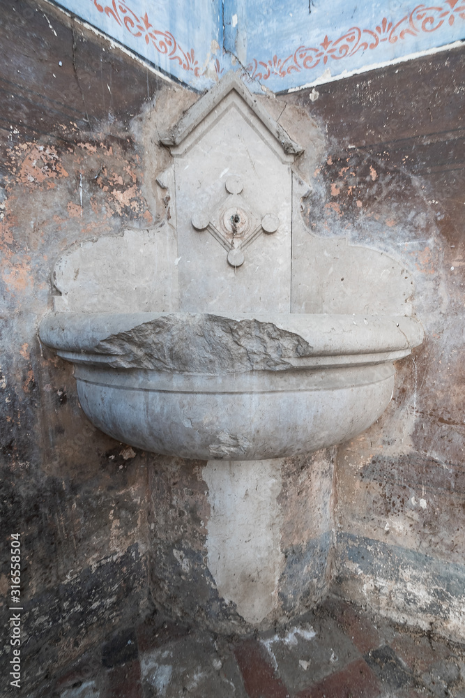 January 2020. Old broken stone fountain January 2020. Old broken stone fountain