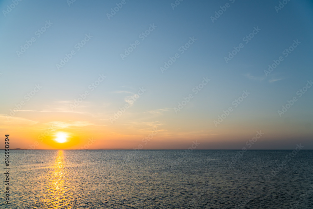 sunset sky in the evening over sea