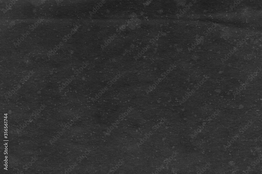 Cardboard black abstract texture close-up. Dark old paper background. Grunge concrete wall. Vintage blank wallpaper. Cardboard black abstract texture close-up. Dark old paper background. Grunge concrete wall. Vintage blank wallpaper.
